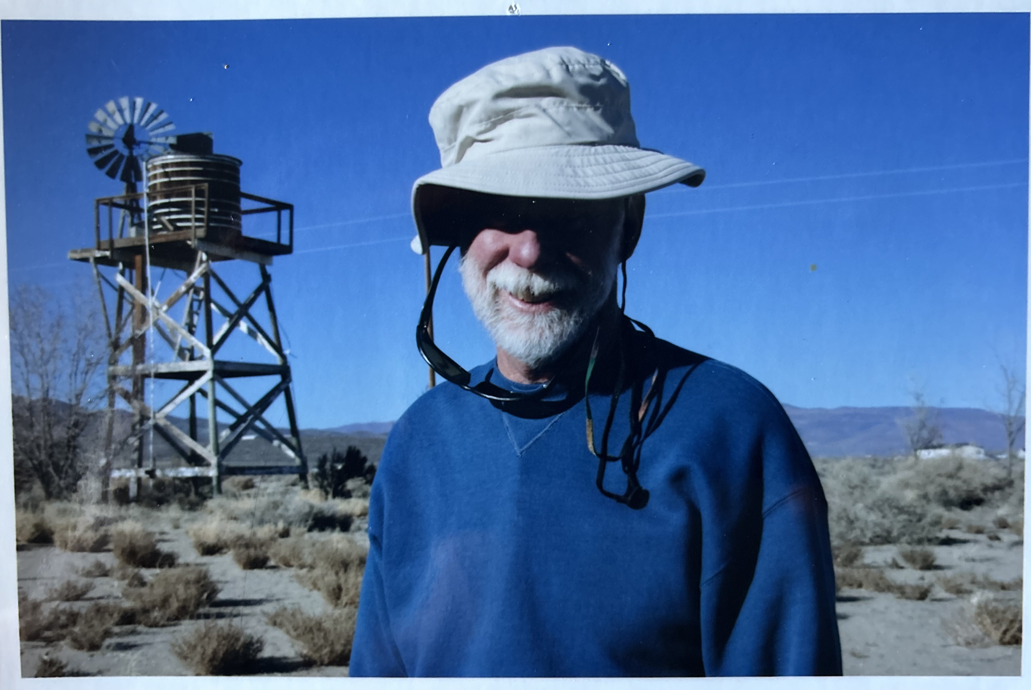 Opa in front of windmill